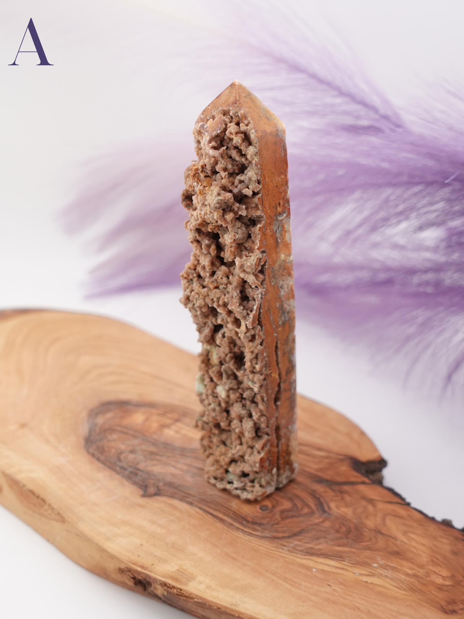 Display of Smithsonite tower option A on a wooden stand