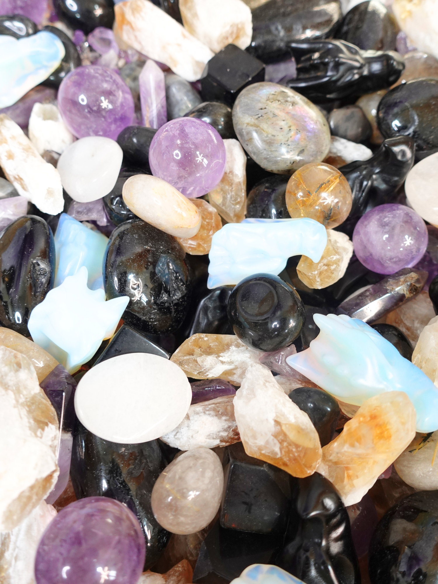 Collection of different shapes and types of crystals that make up the "Dragon Scales" scoop