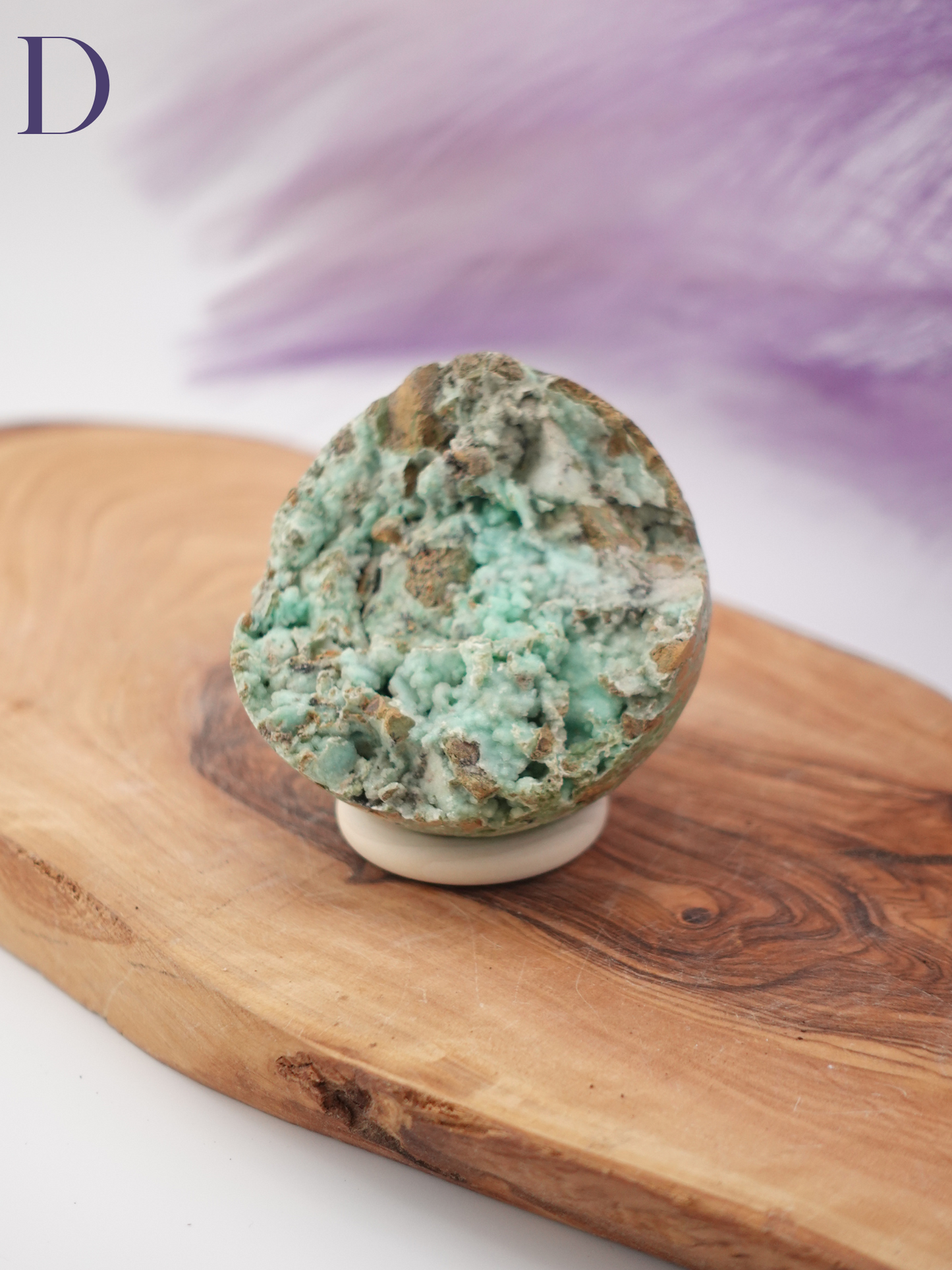 Smithsonite sphere option D on wooden stand