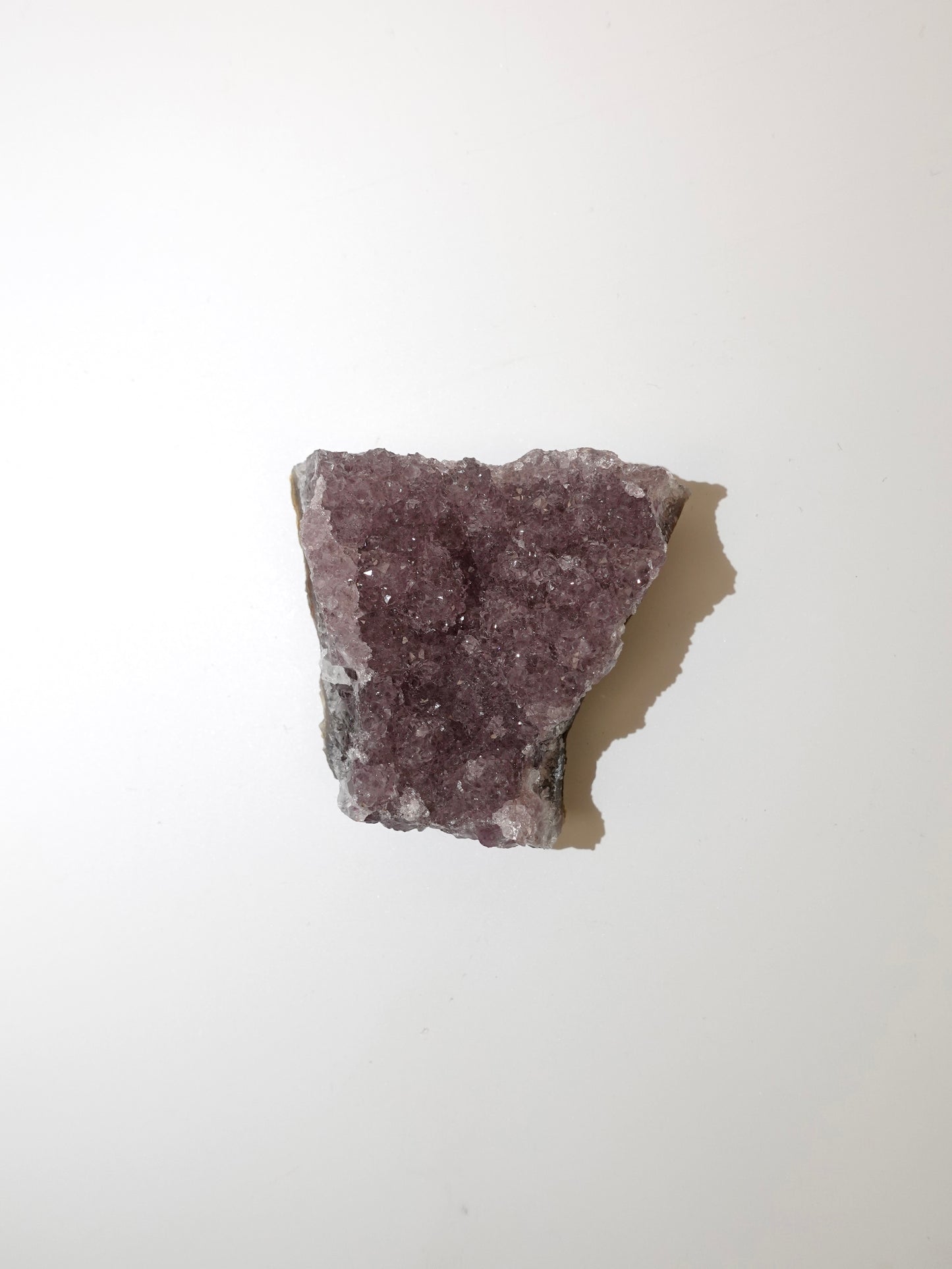 Sugar Amethyst freeform on white background. F