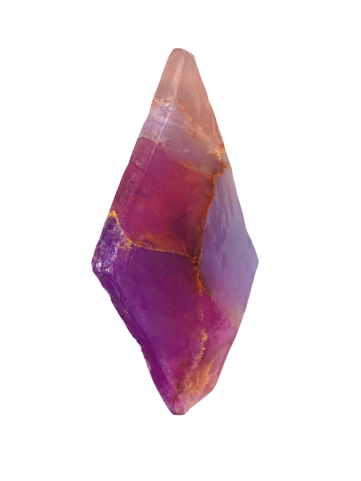 Multicolored crystal inspired soap on a white background