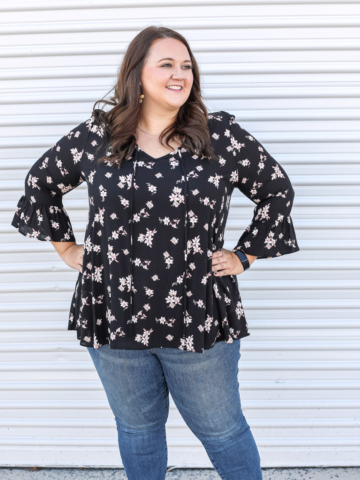 Floral dress blouse with beautiful bell sleeves.