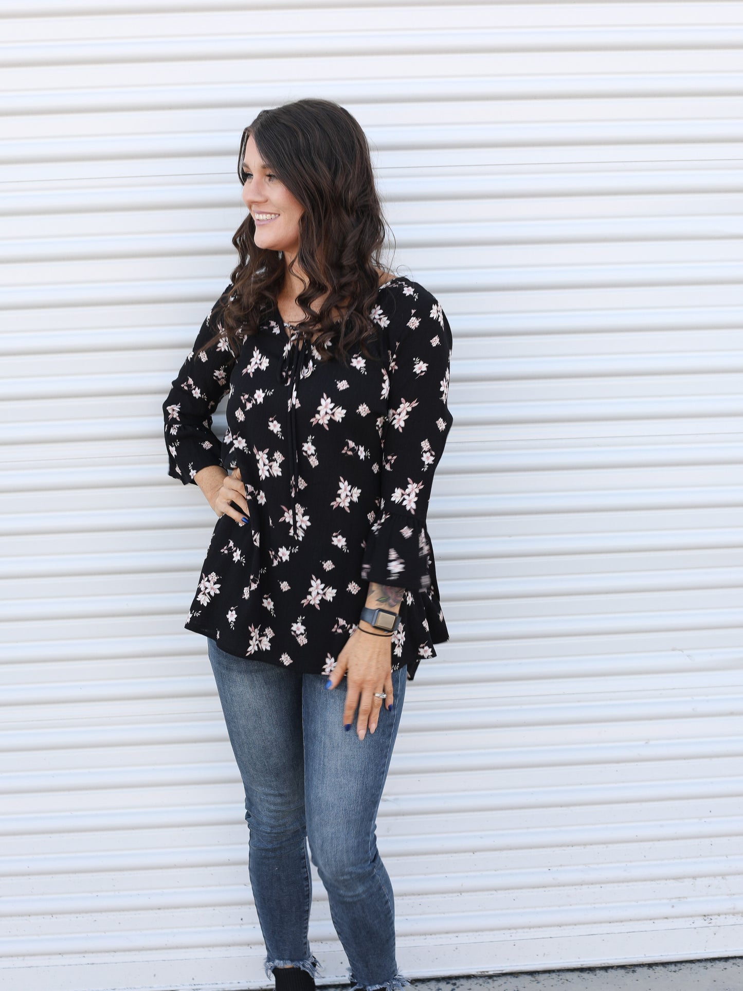 Floral blouse styled with jeans for a casual look