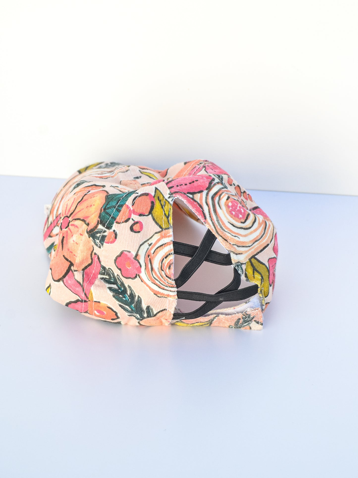 Back view of pink baseball hat.