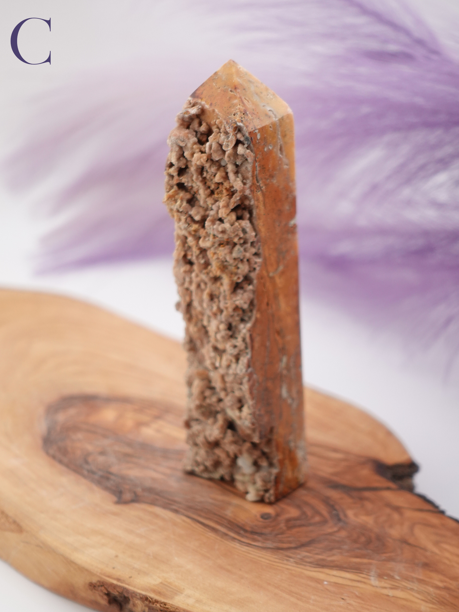 Display of Smithsonite tower option C on a wooden stand