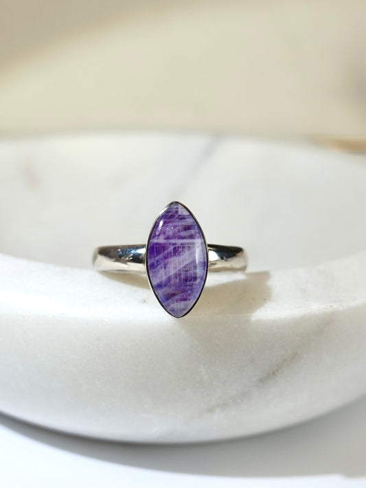 purple moonstone marquise ring on marble display