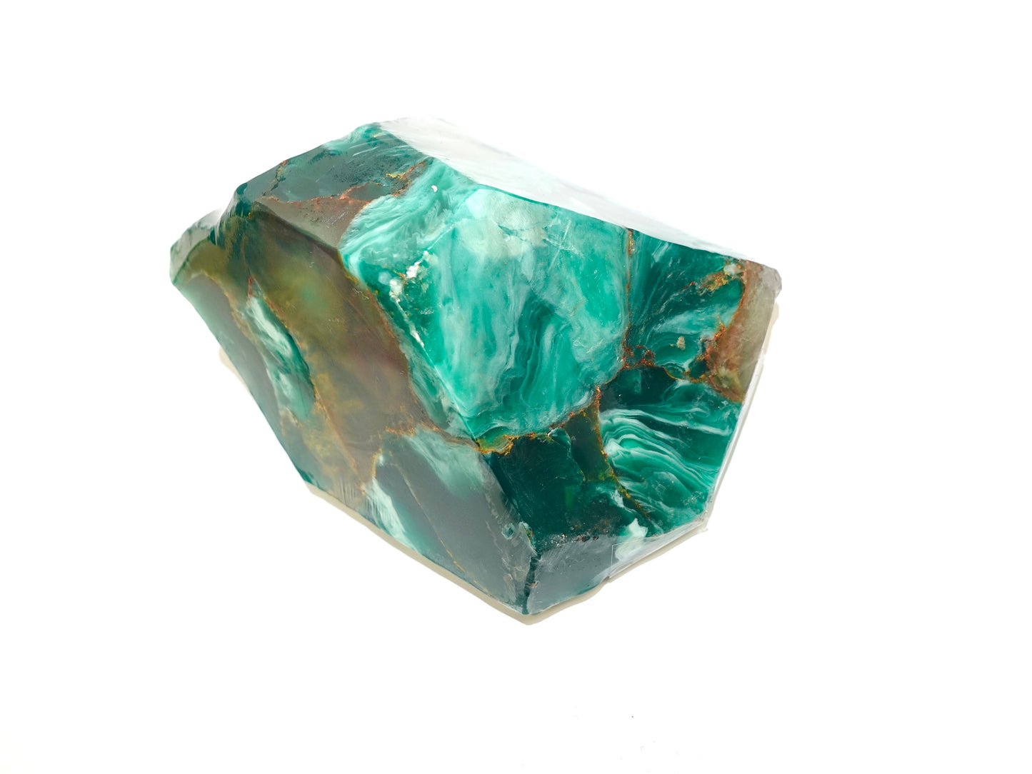 Green marbled soap bar on a white background