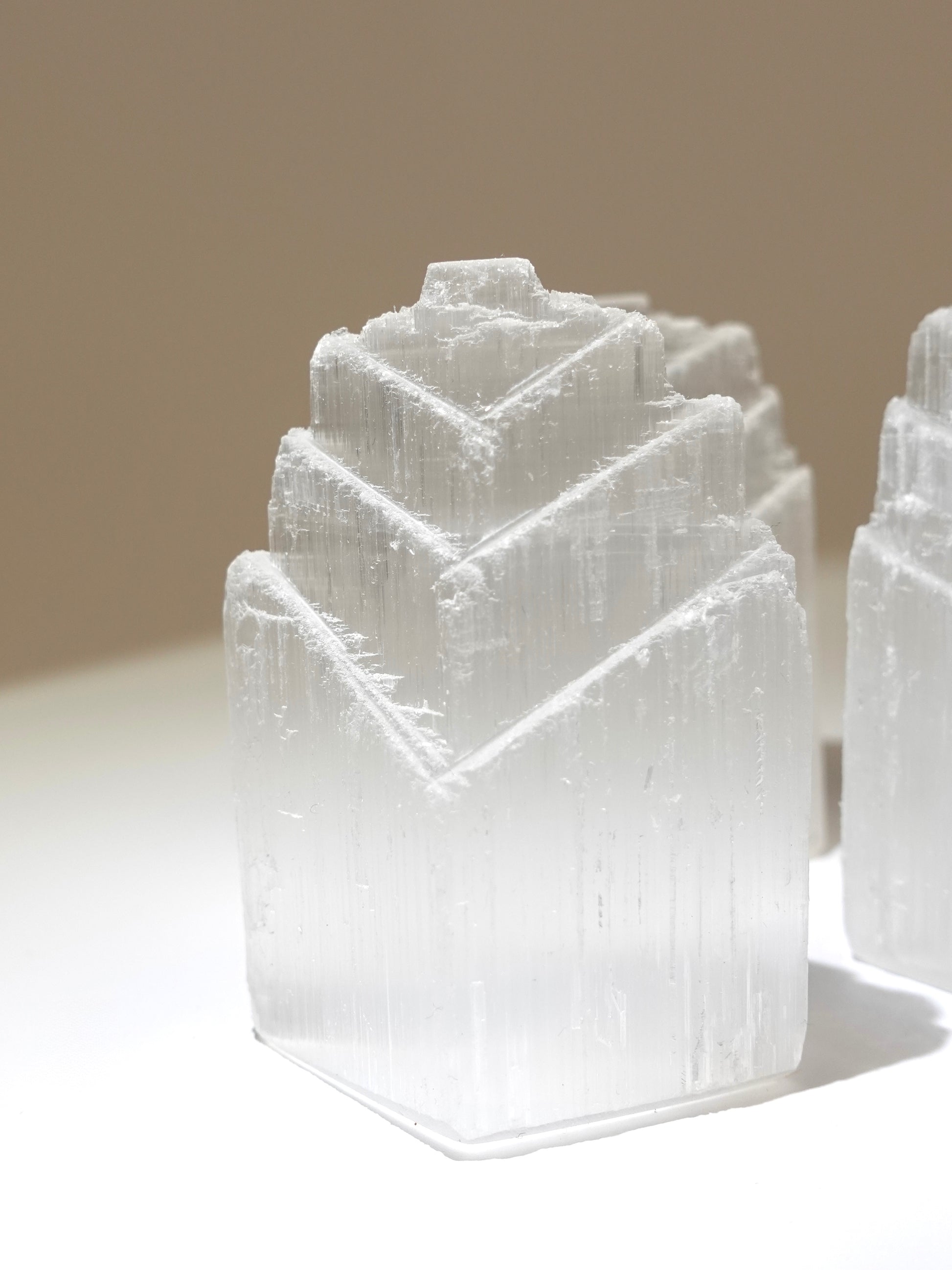 Selenite Domino Tower on white background