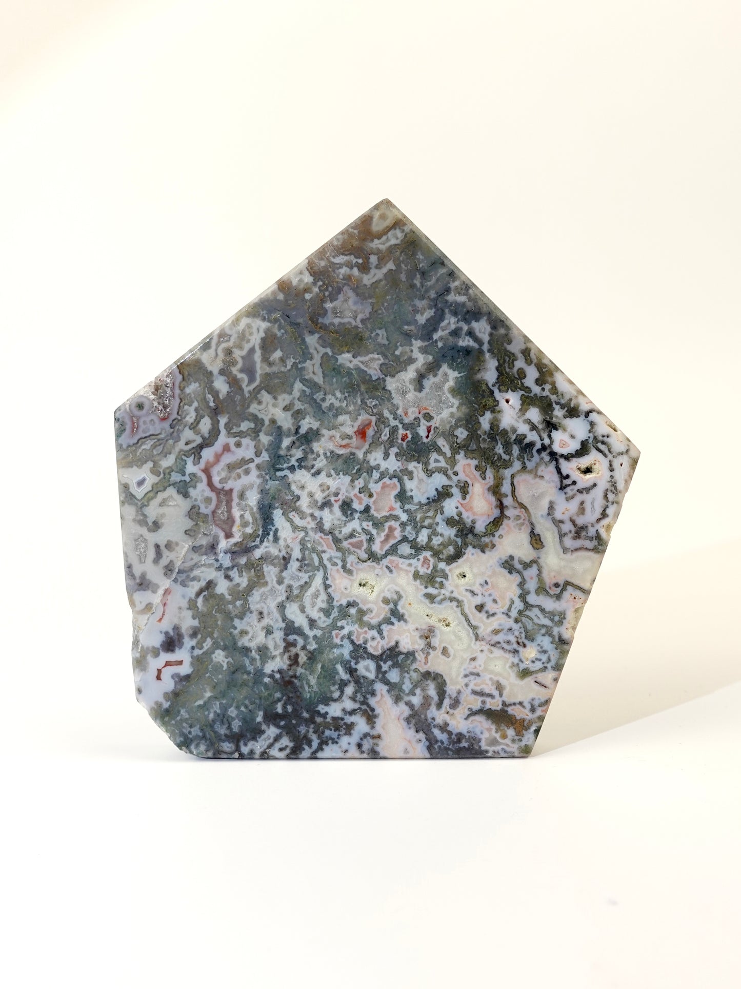 Pink Moss Agate slab on white background C
