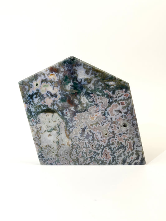 Pink Moss Agate slab on white background A