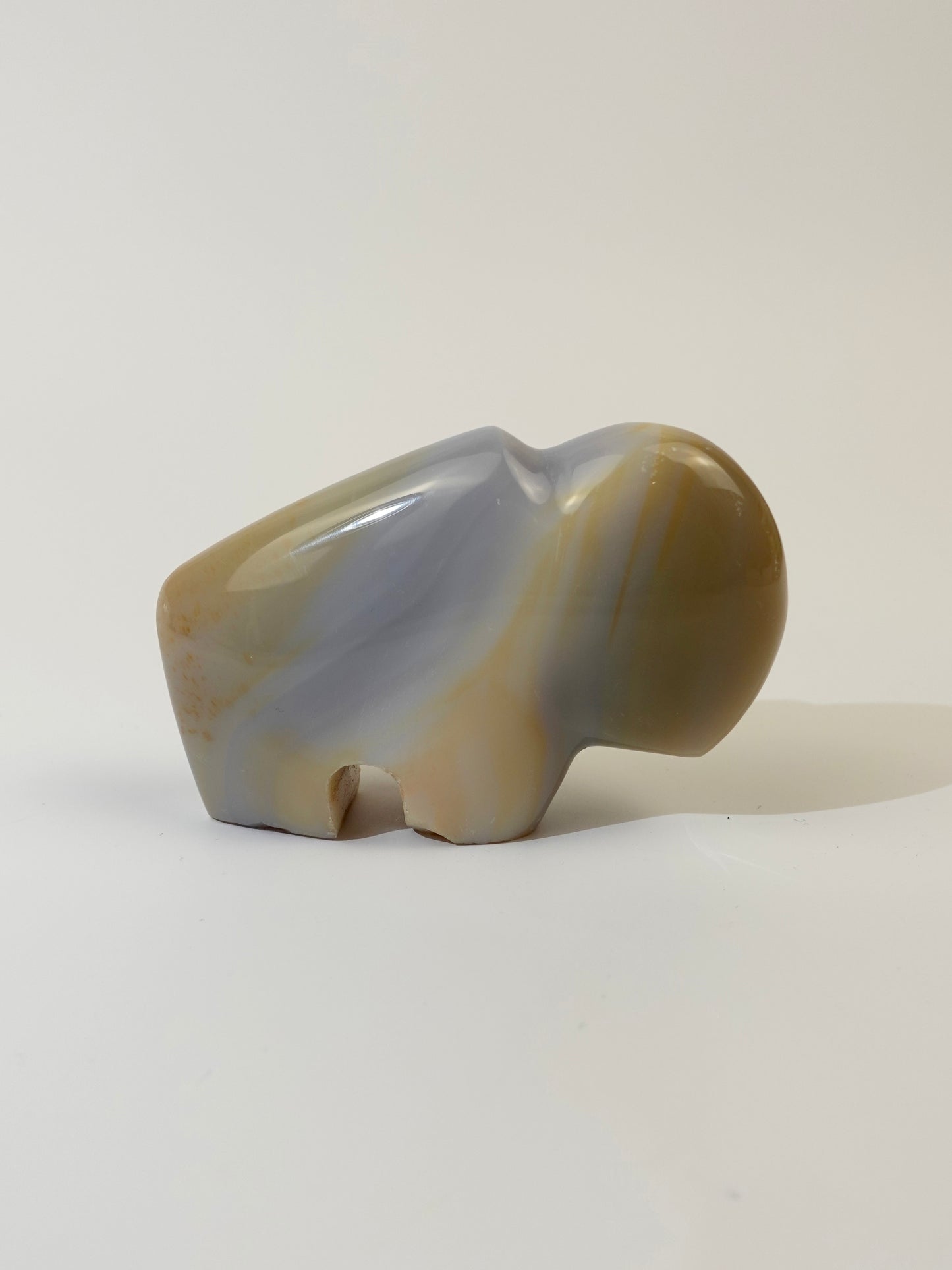 Agate bison on white background. B