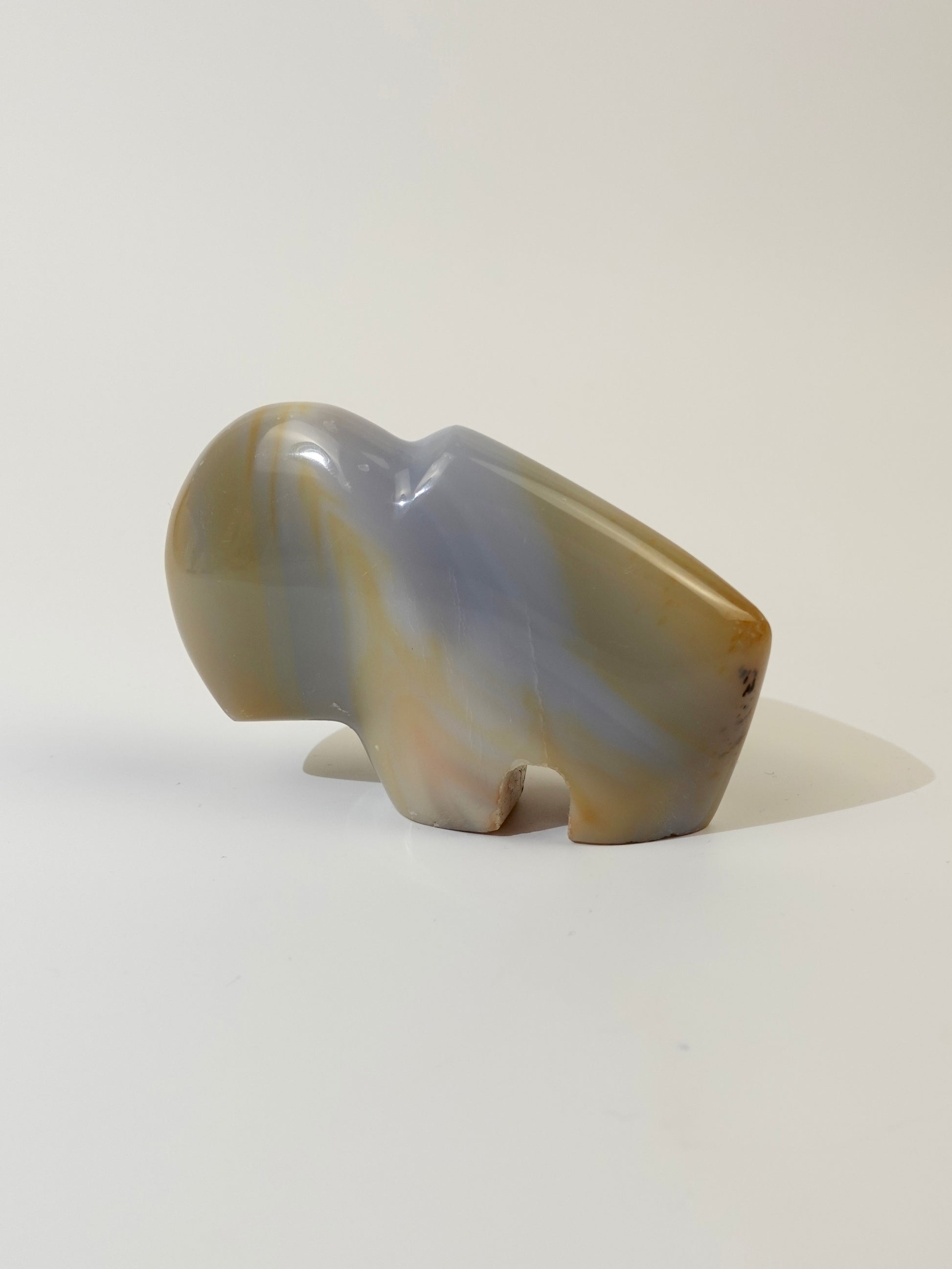 Agate bison on white background. B