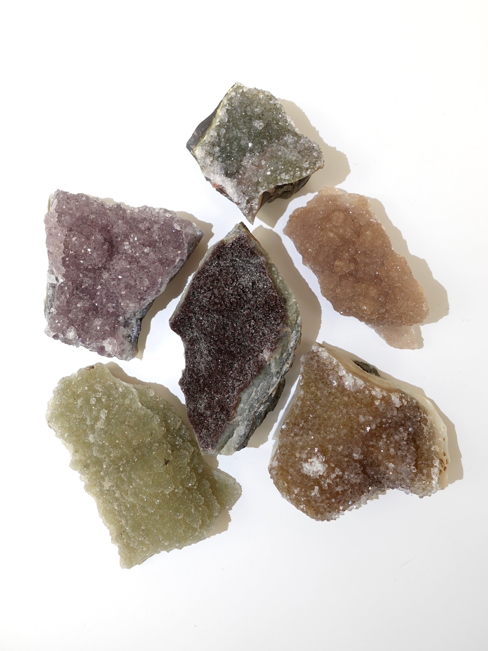 Sugar Amethyst freeforms on white background