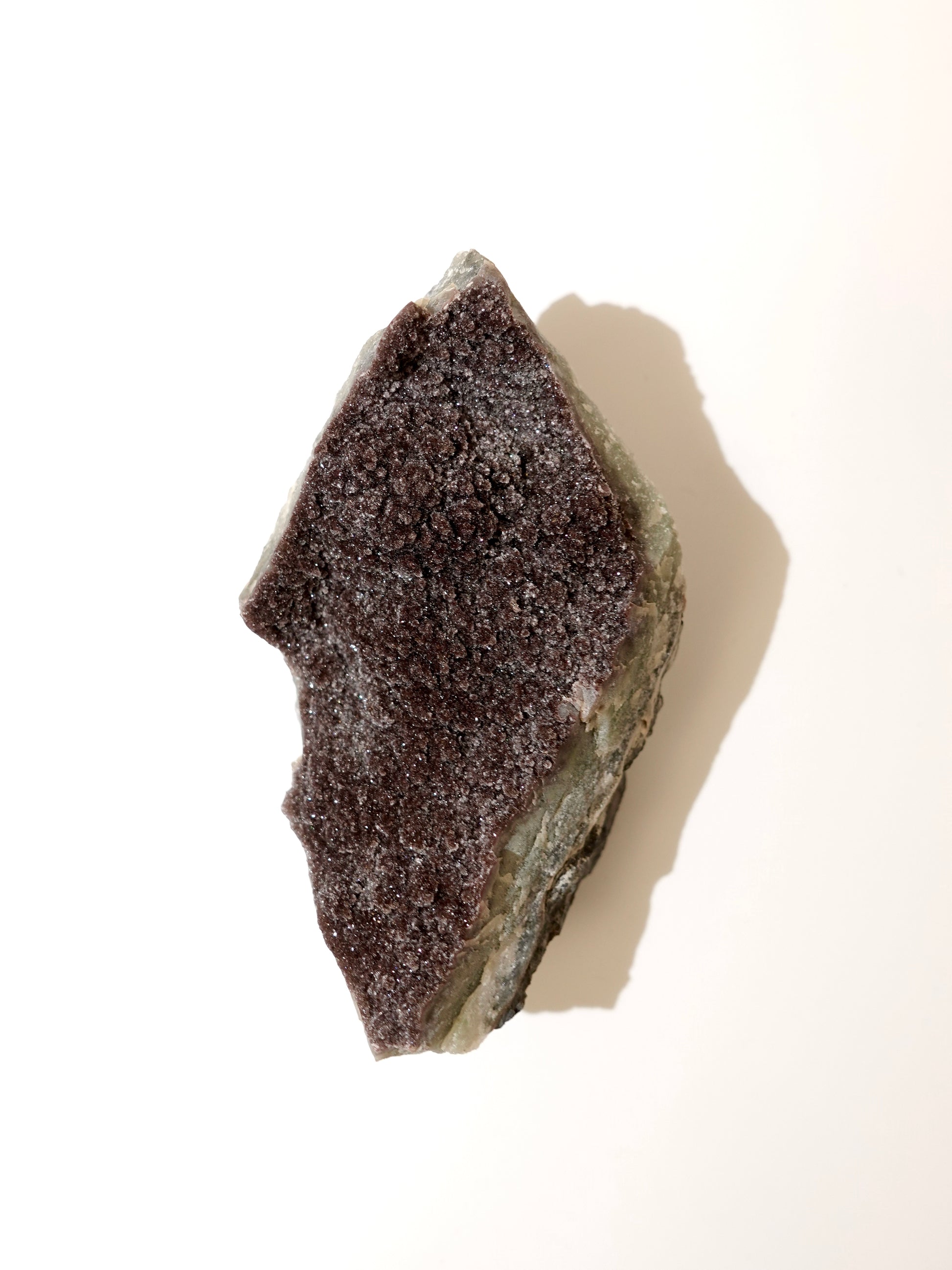 Sugar Amethyst freeform on white background. E