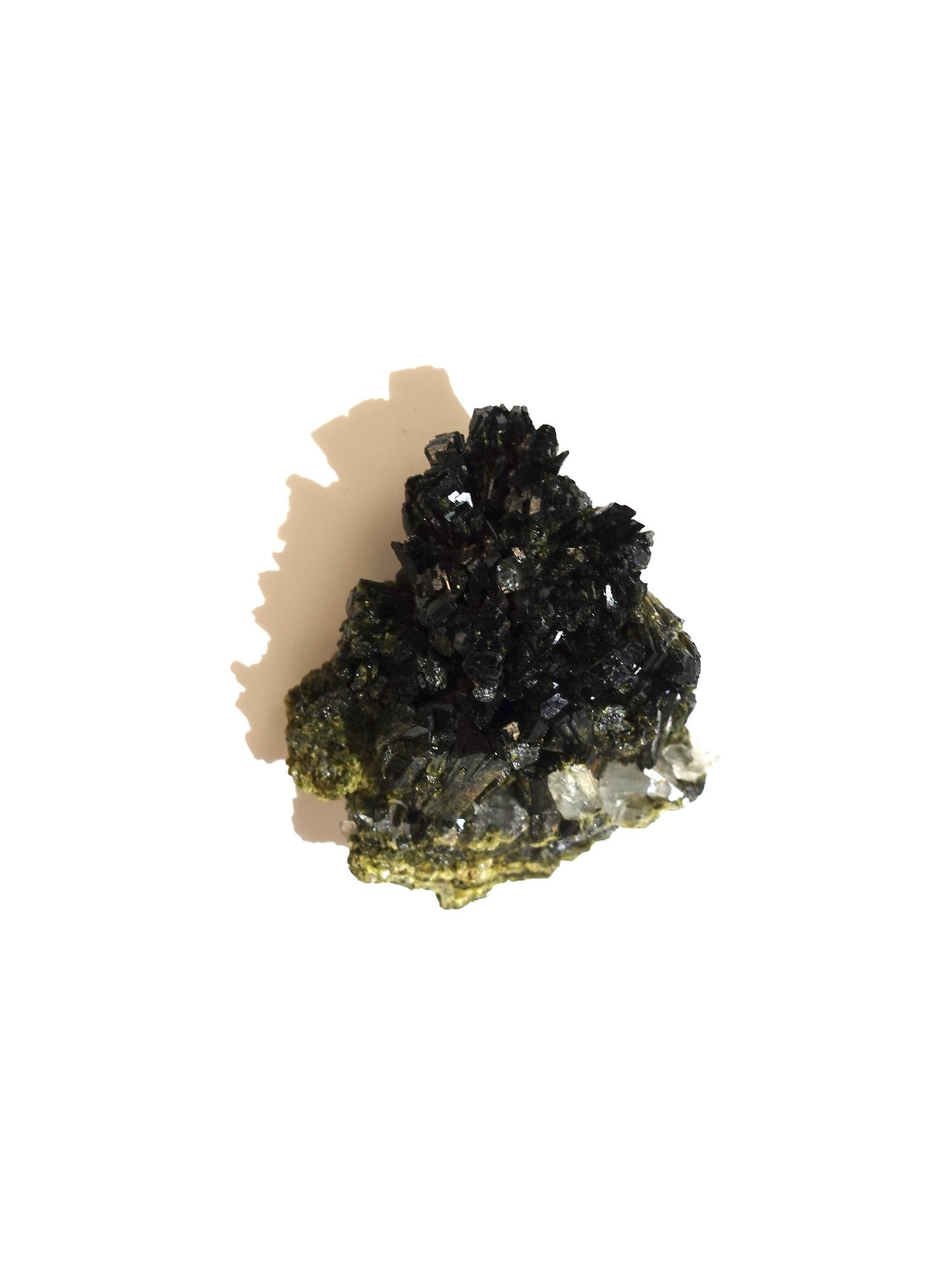 Epidote specimen on white background