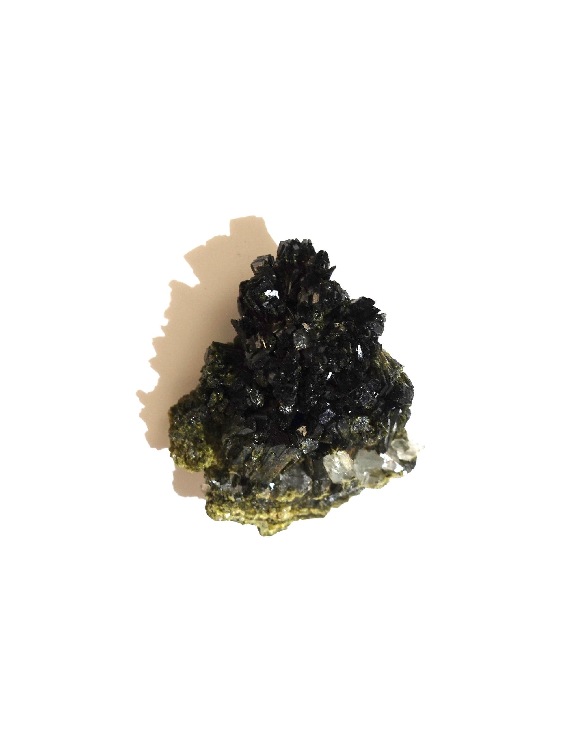 Epidote specimen on white background