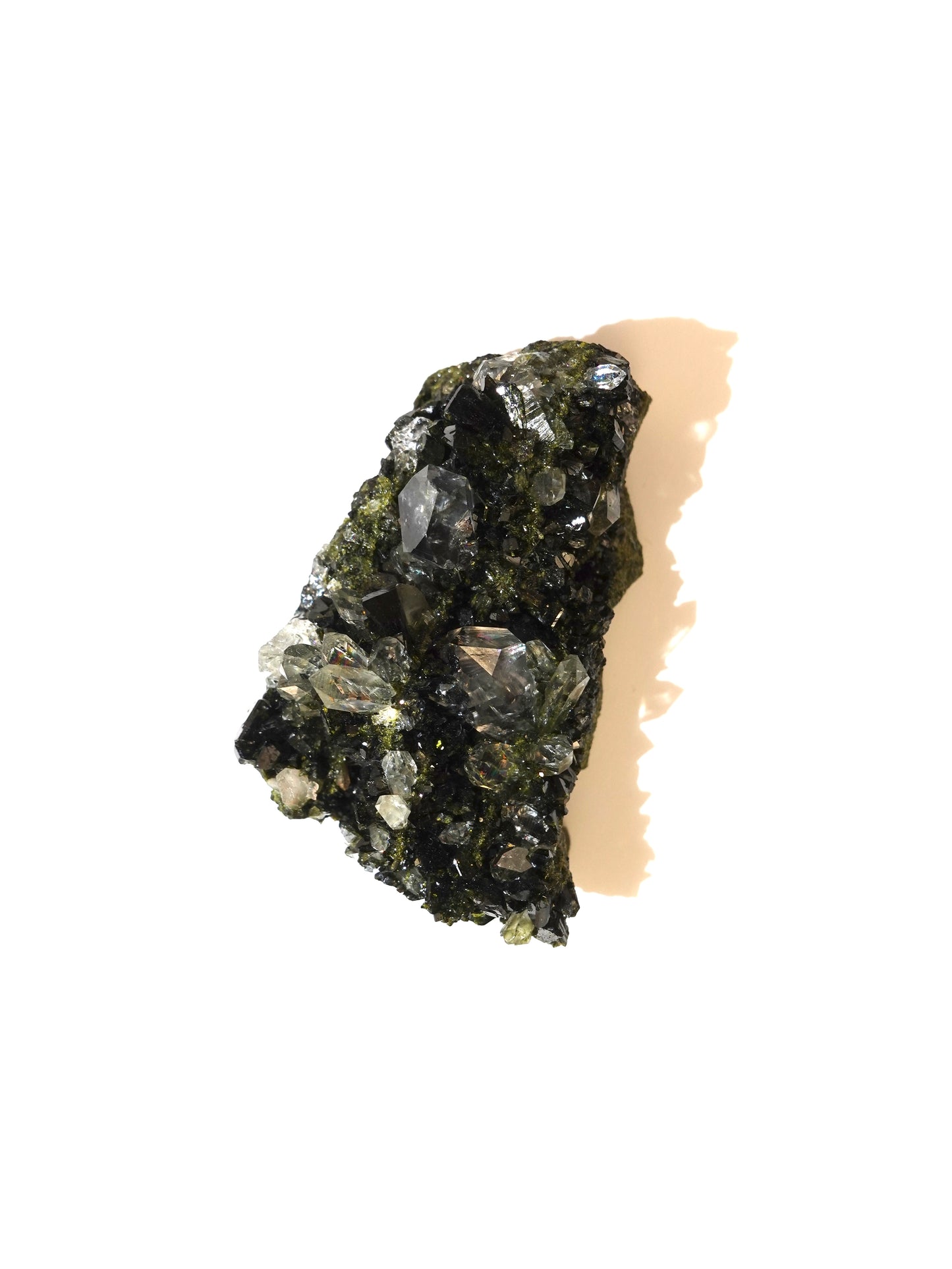 Epidote specimen on white background