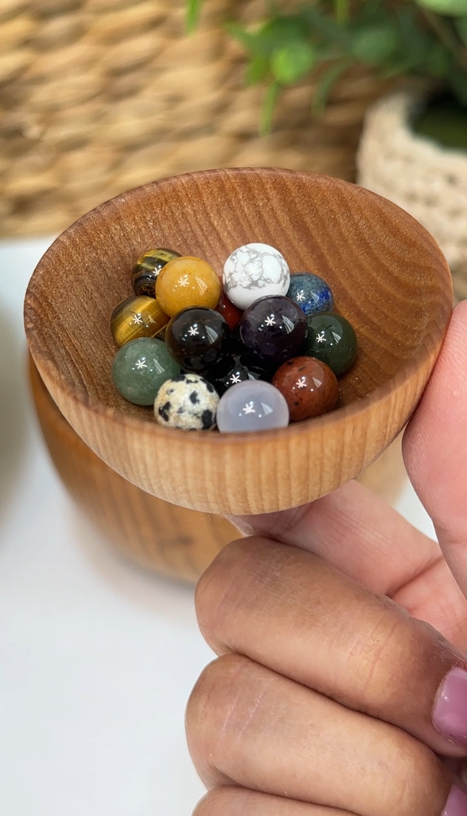 An example of a mini sphere scoop in a small wooden dish