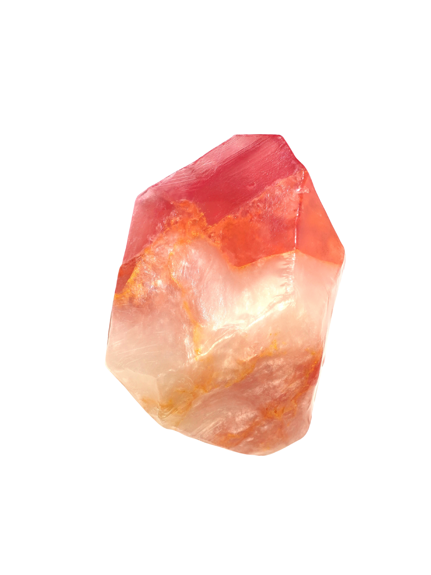 Polished red-orange crystal inspired soap on a white background