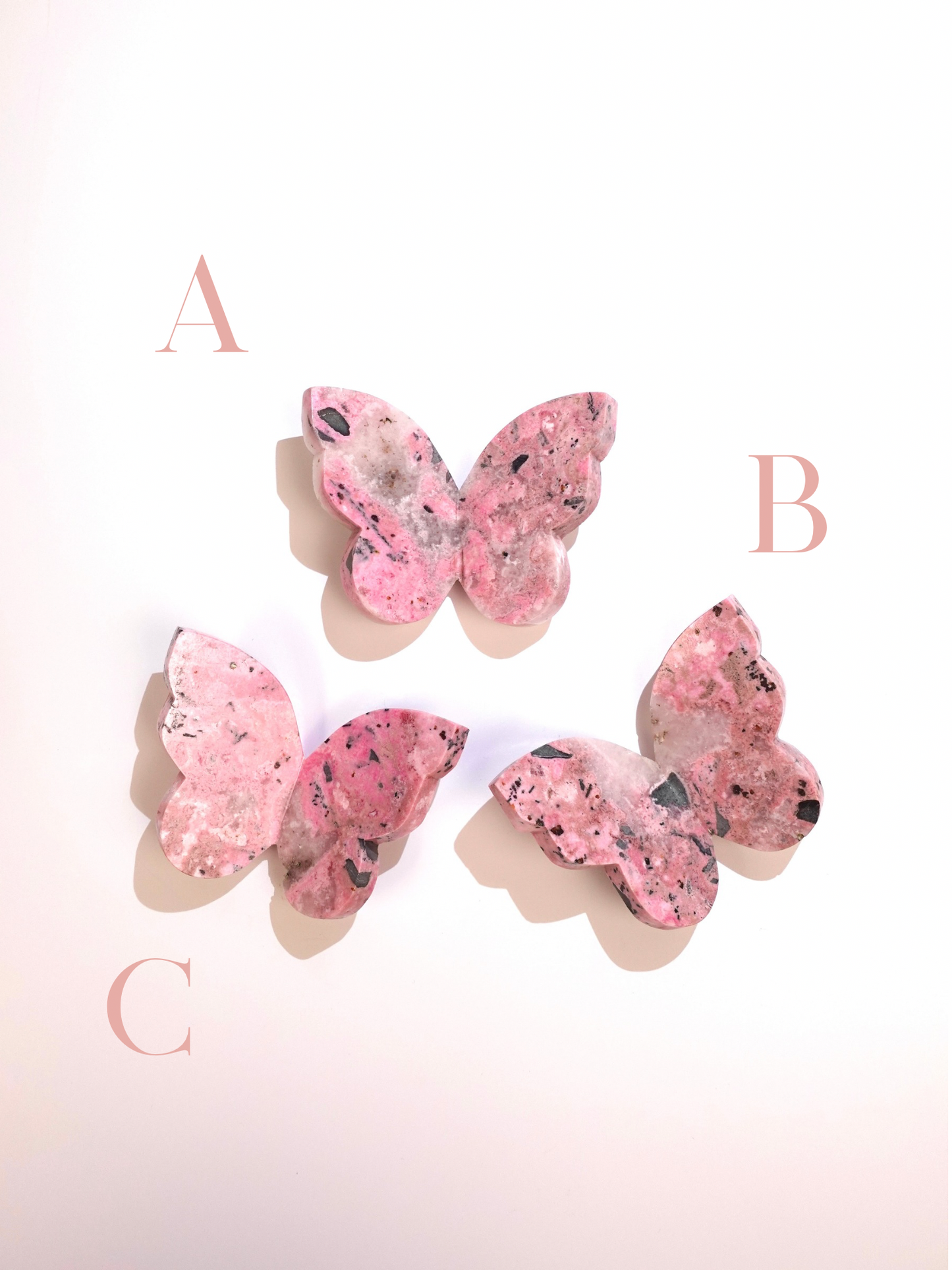 Labeled A B C Icy Rhodonite 3D Butterflies on white background