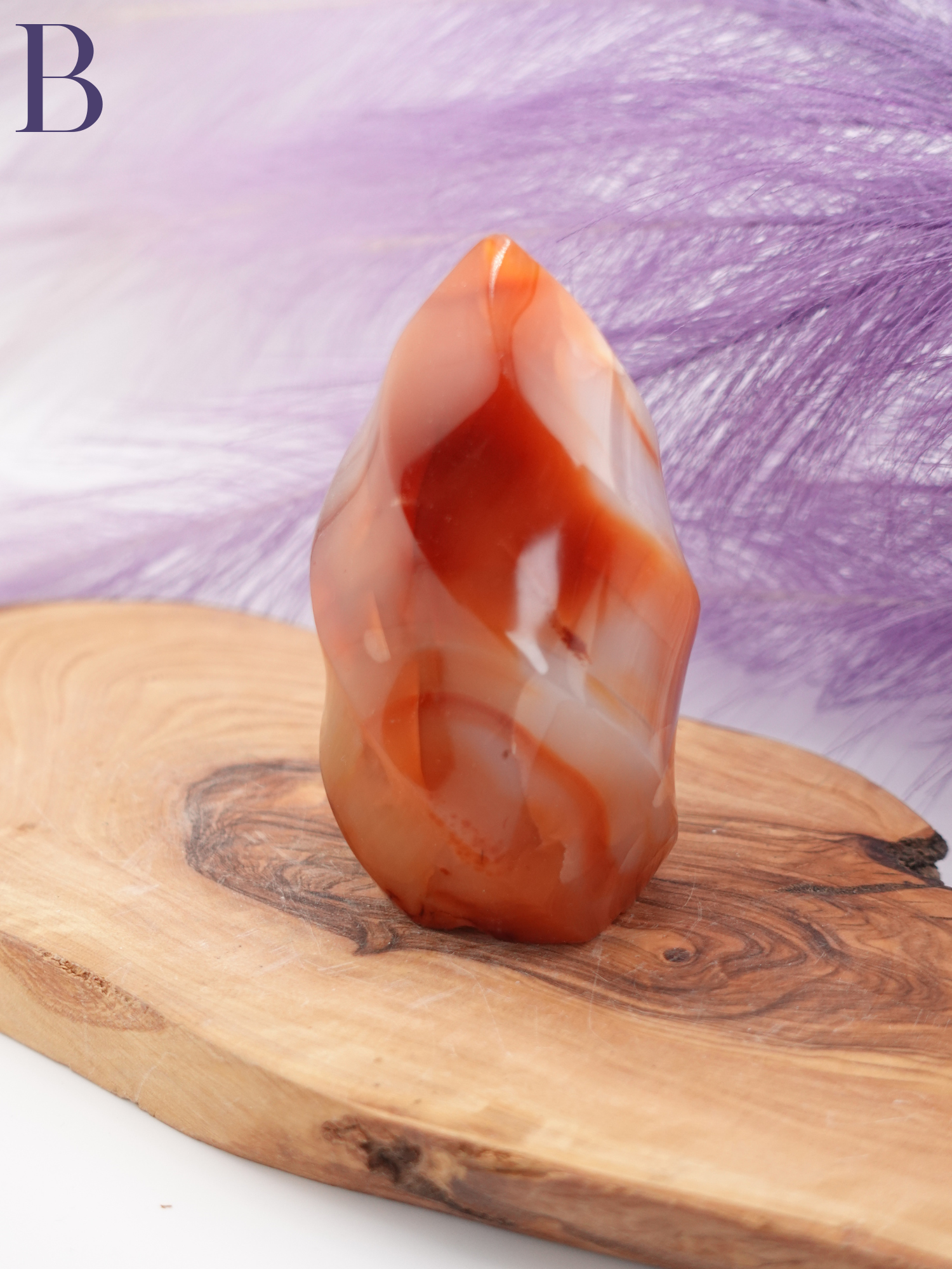 Carnelian flame option B on wooden display stand