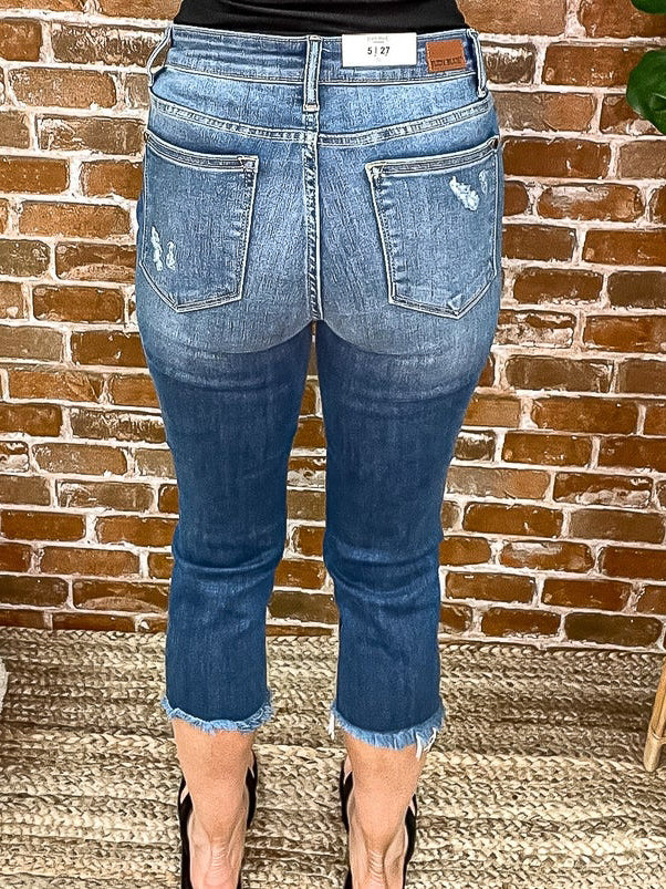 Back view of blue jean capris, minimal distressing