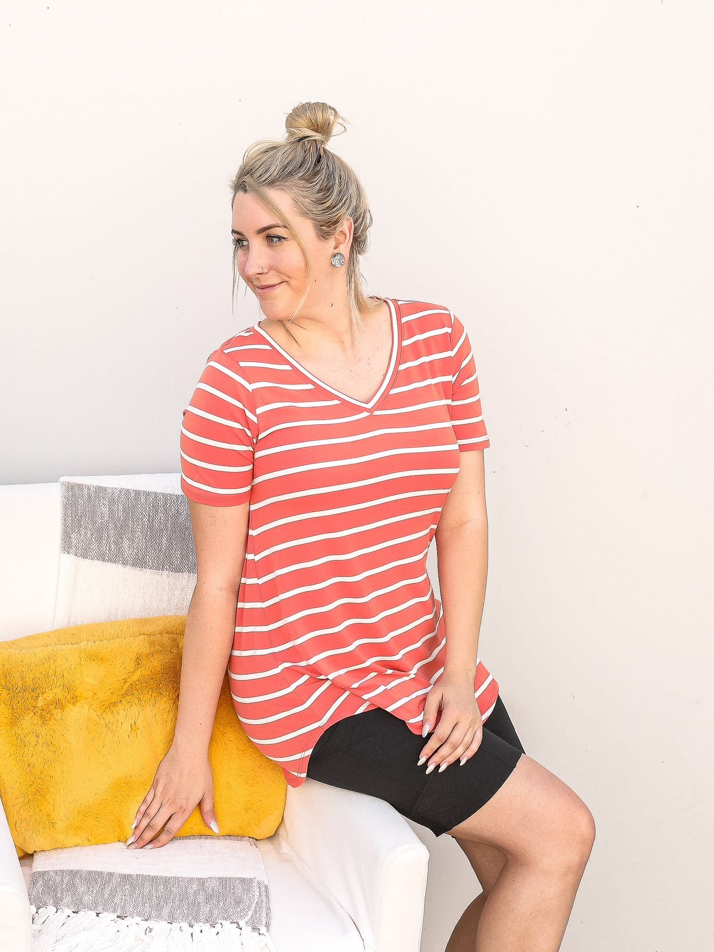 Copper, light weight v neck short sleeve  top with horizontal stripes down the front.
