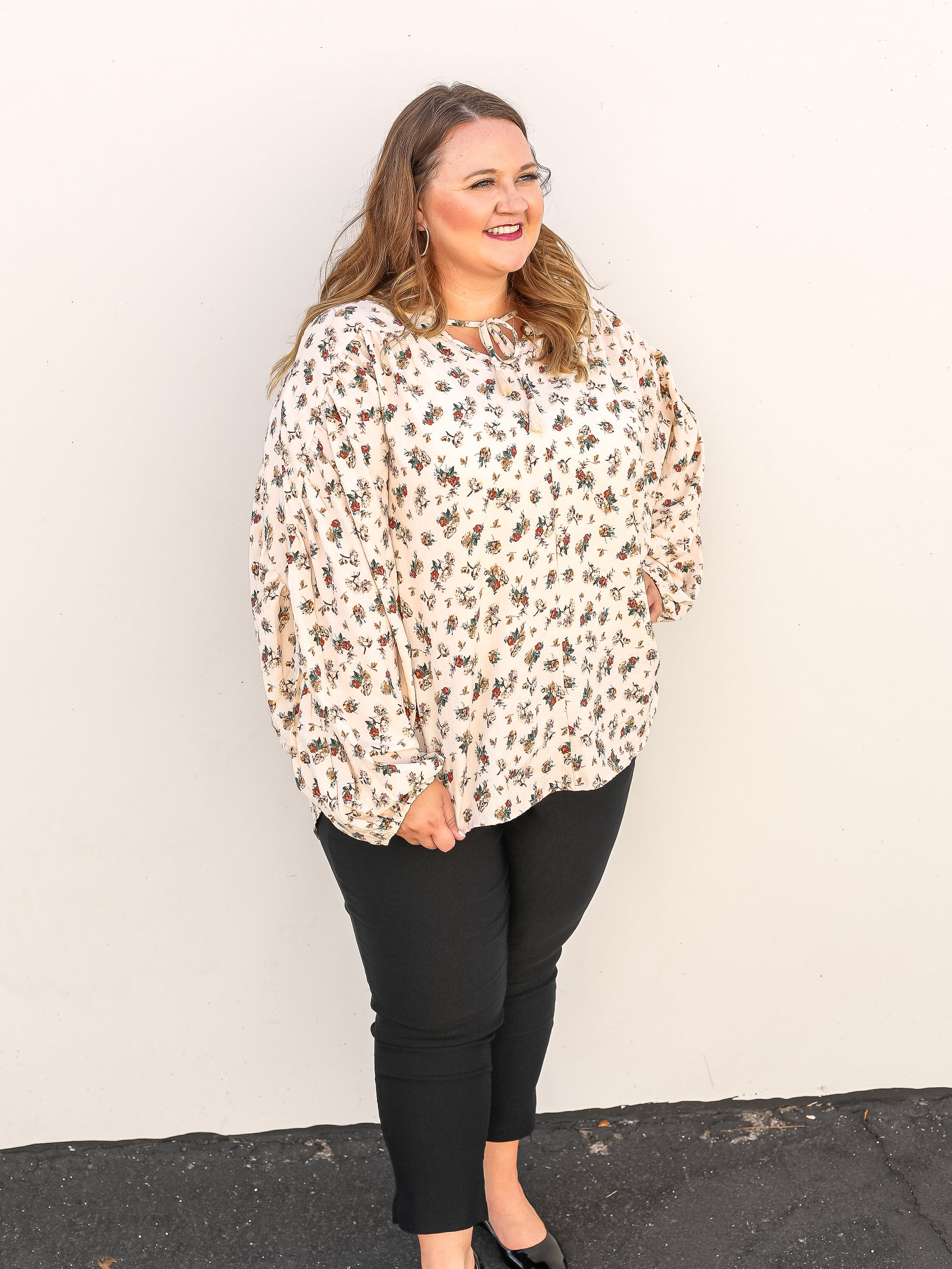 Ivory and floral blouse with balloon sleeves