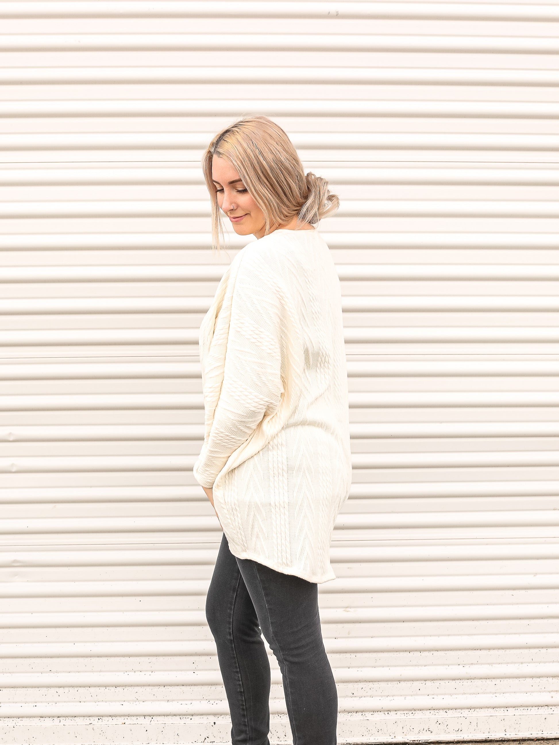 Side view of classic off white cardigan