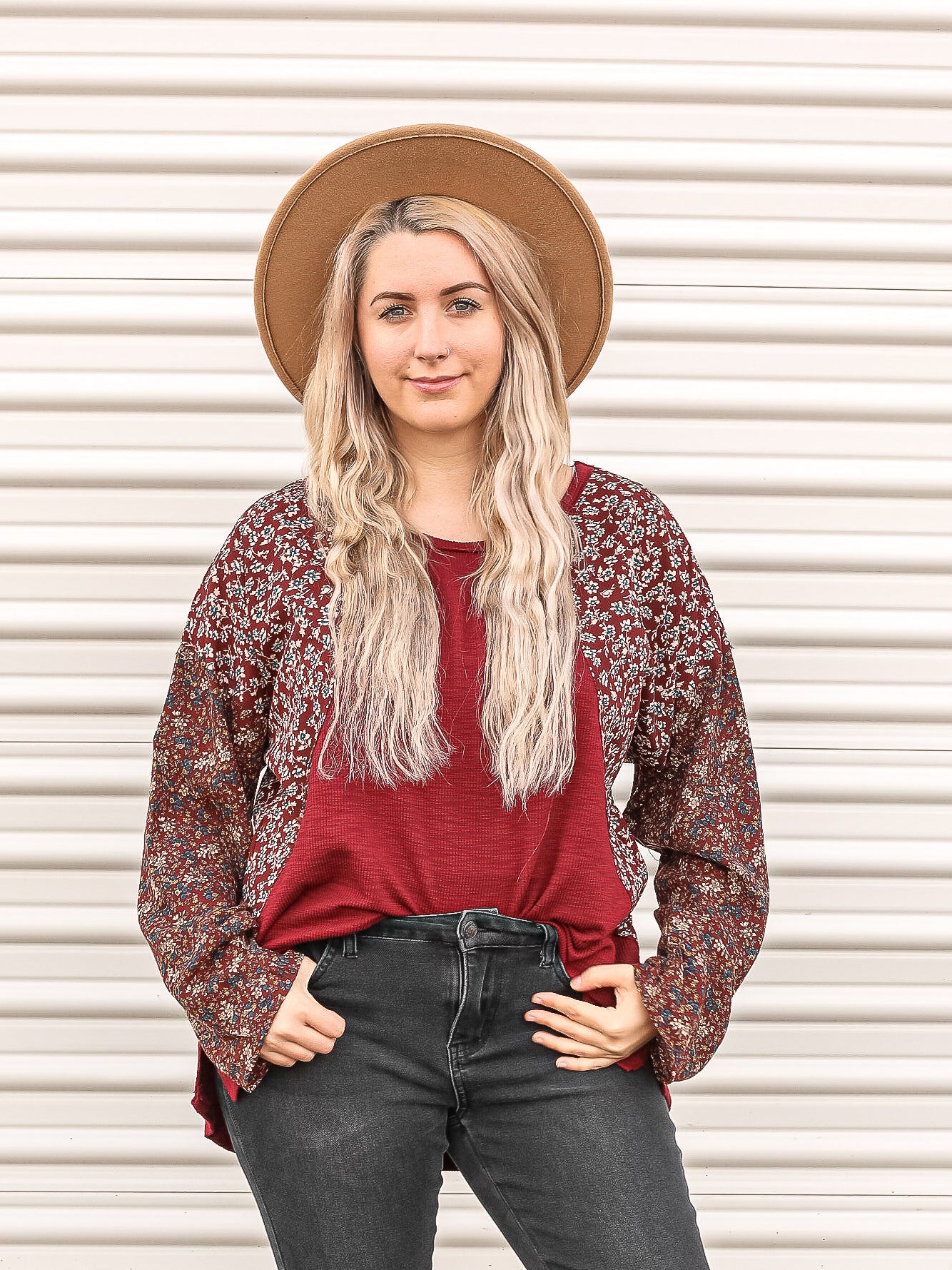 Deep red top with floral sleeves