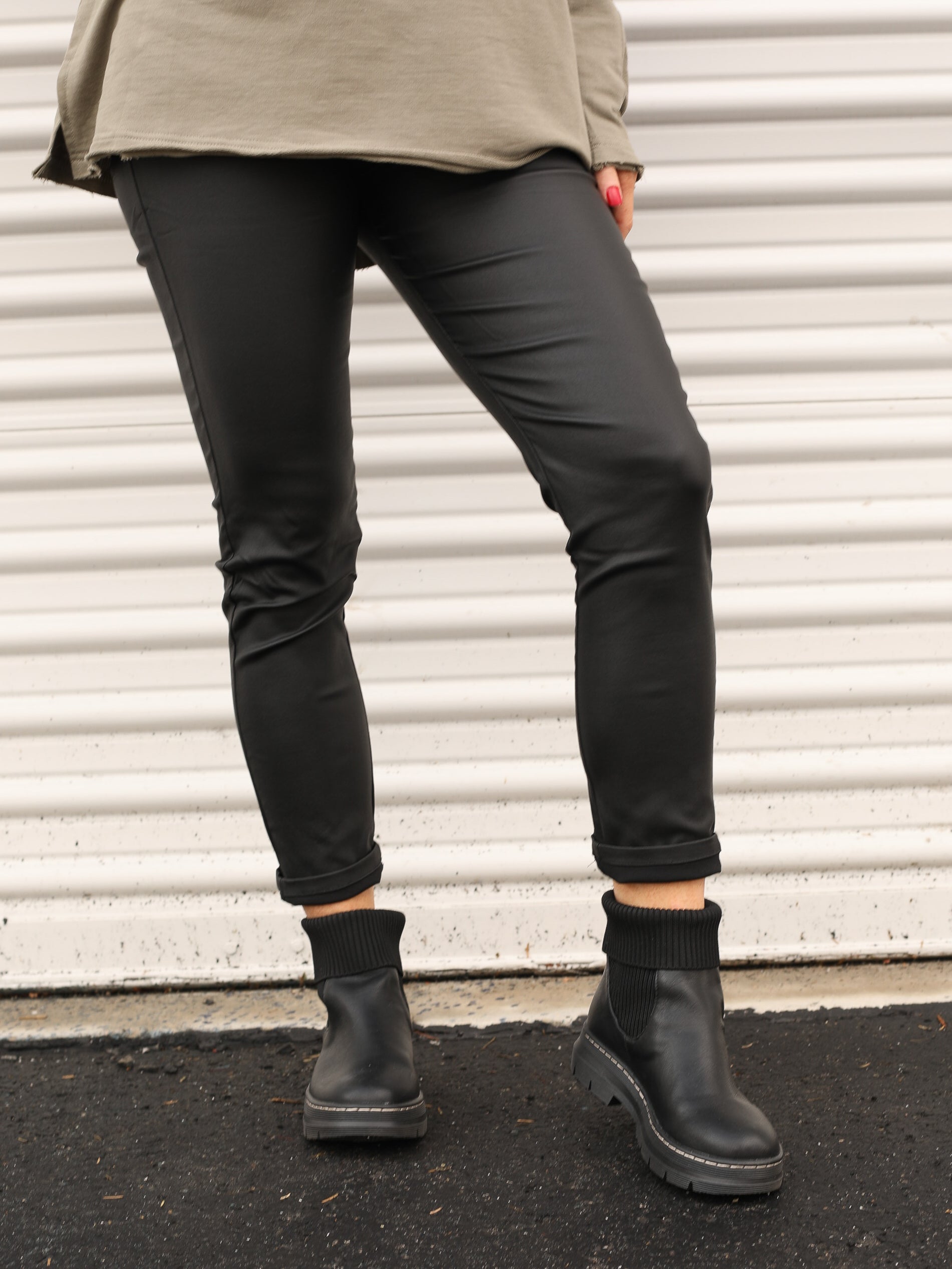 Metallic leggings front view with boots