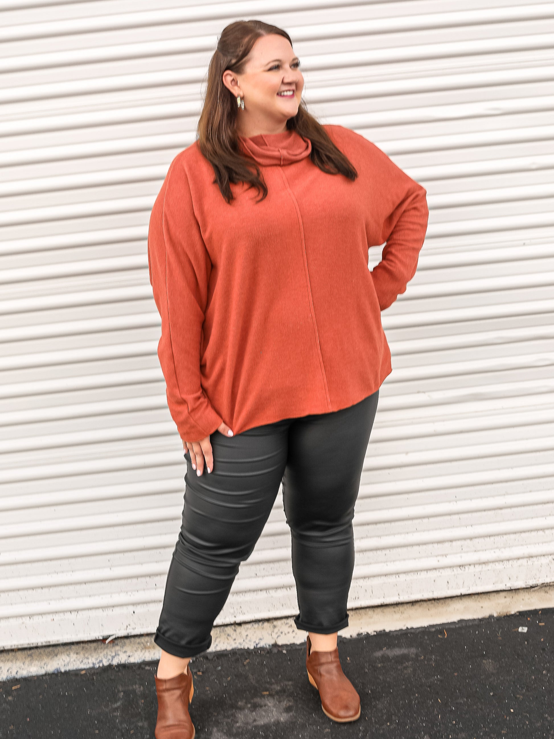 Full outfit styled with the metallic jeggings and orange sweater