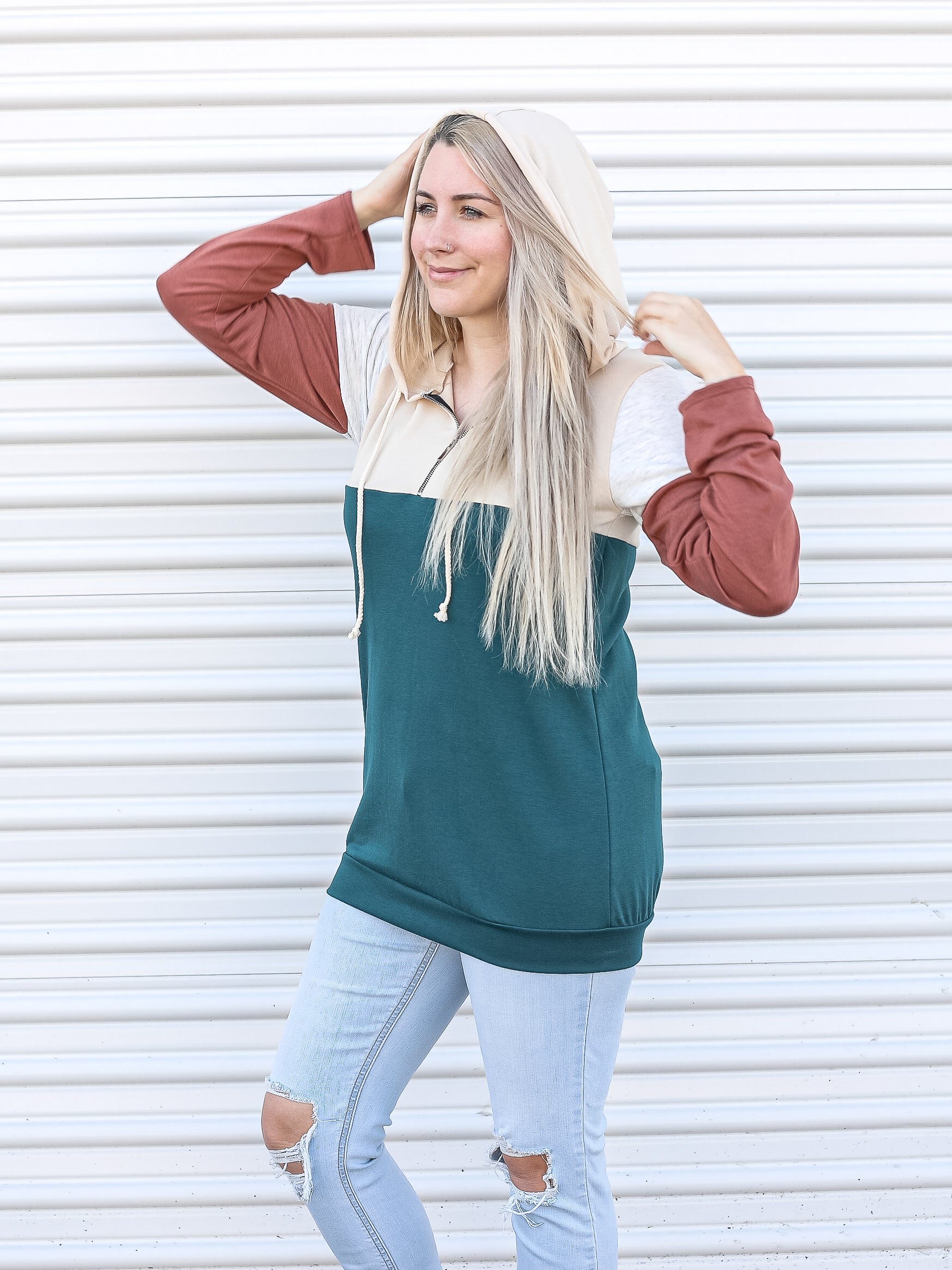 Half zip sweater with multiple colored blacked details