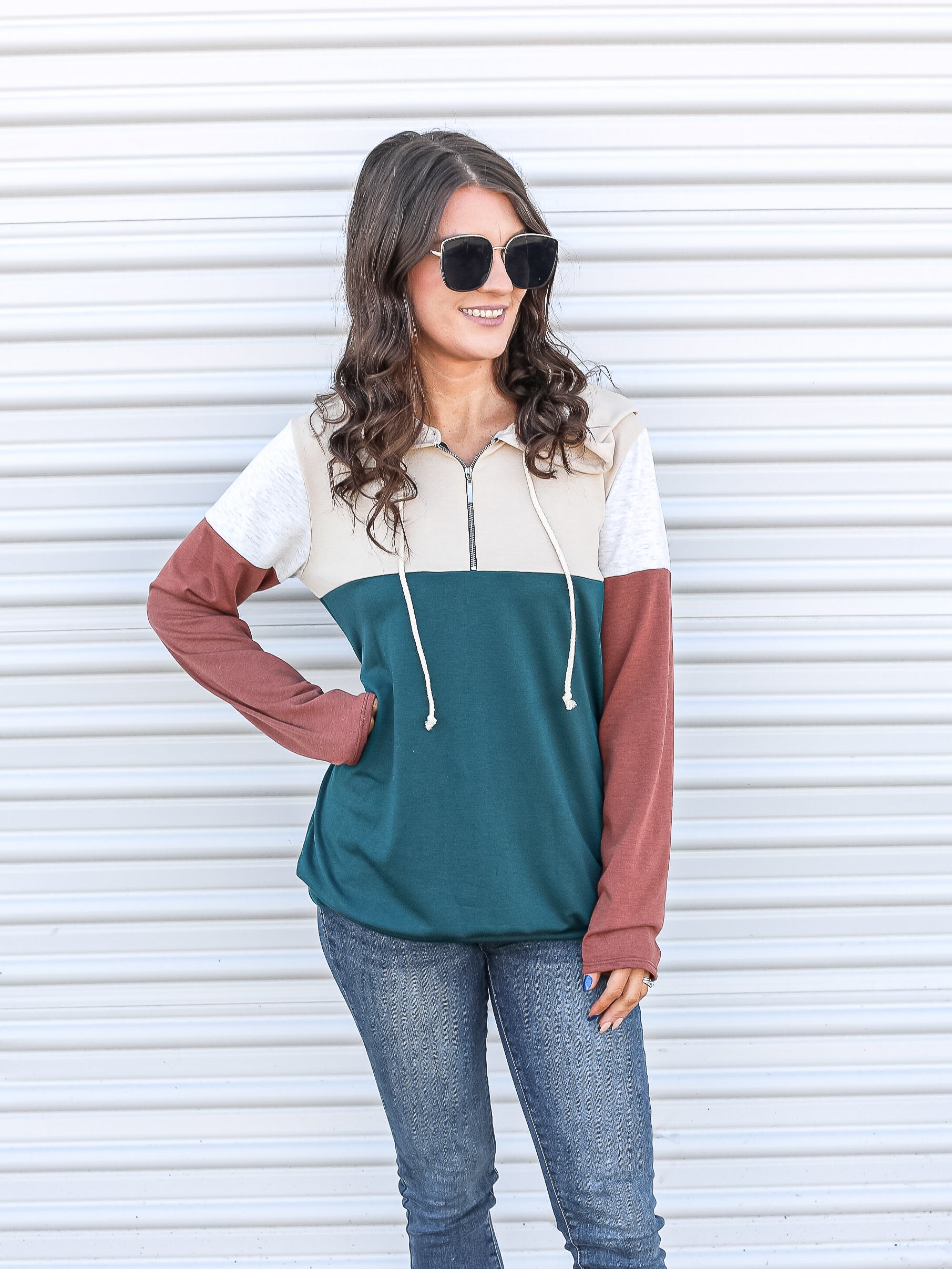 Multi colored block pull over with jeans