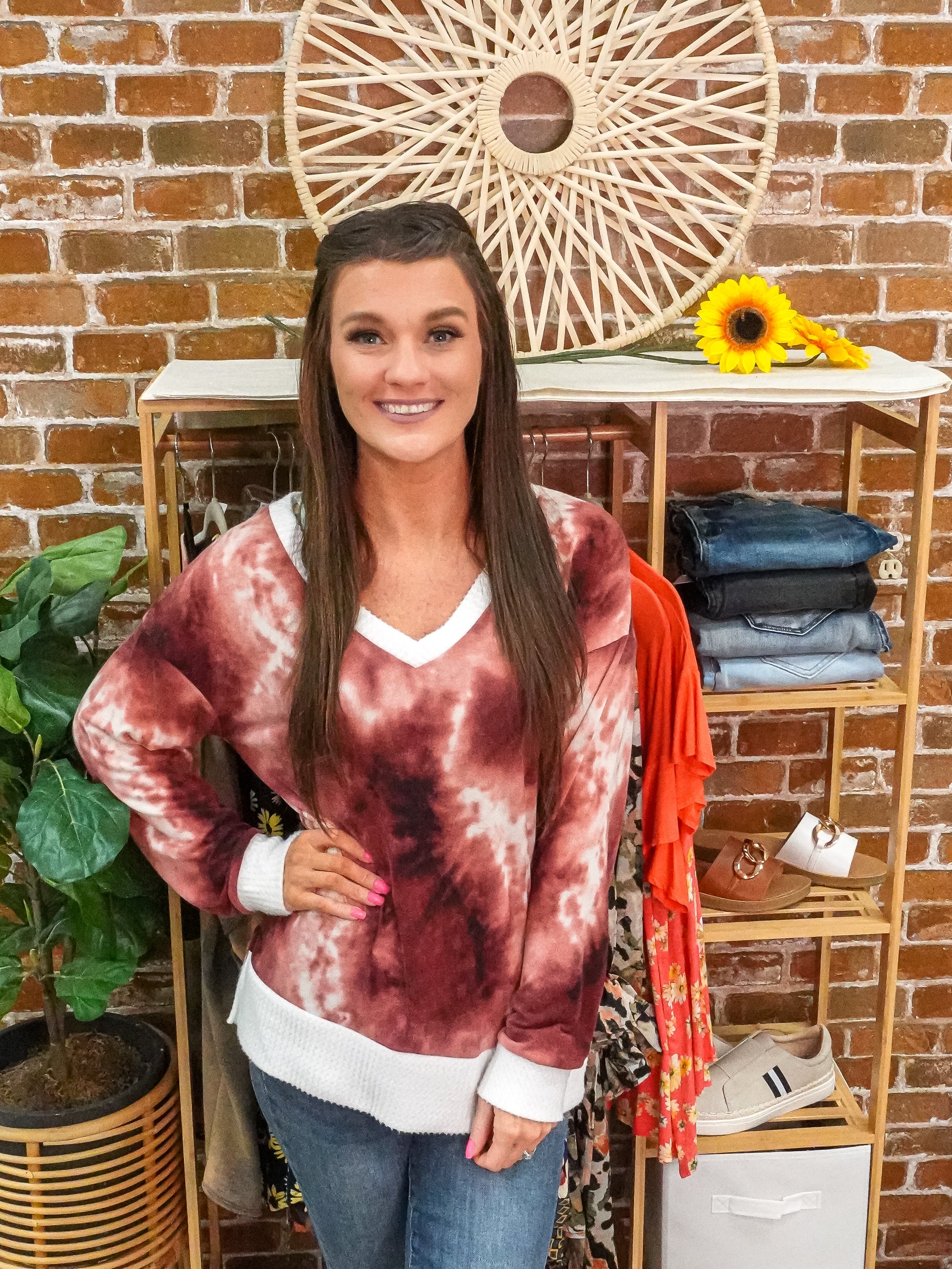 Burgundy tie dye colored long sleeve with white trim details 