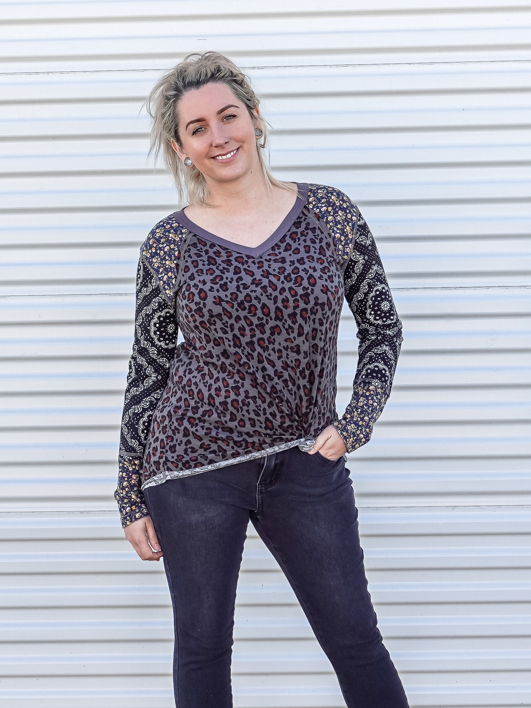 Three patterned long sleeve with leopard, paisley and  floral patterns.