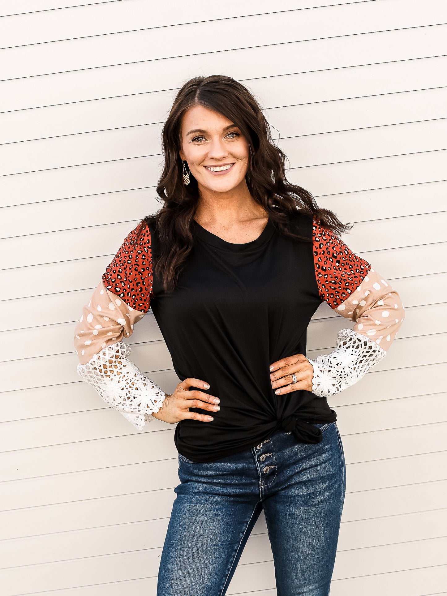 Long sleeve top with mix patterns down the sleeve. 