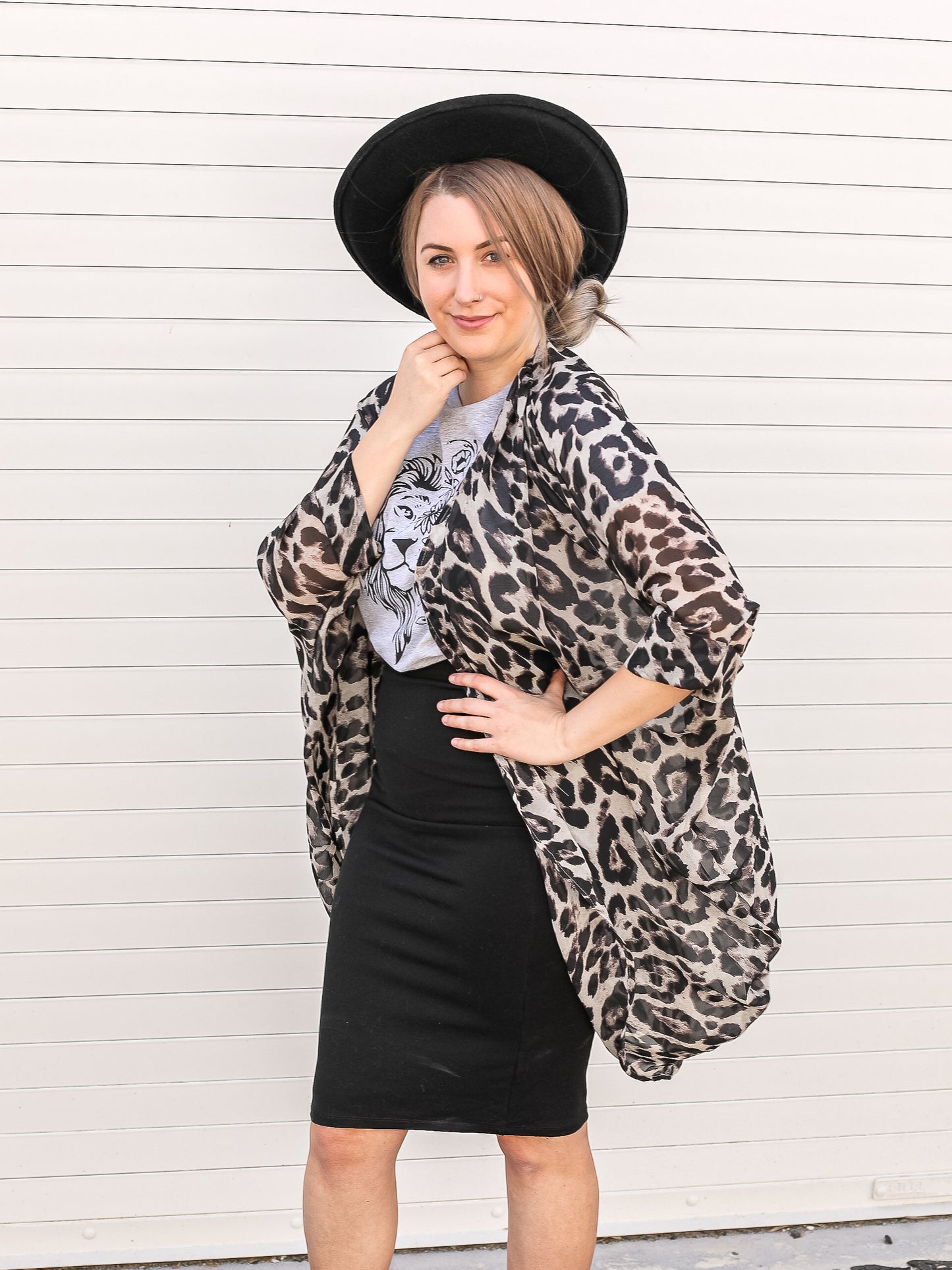 Leopard kimono dressed up with a pencil skirt and graphic tee. 