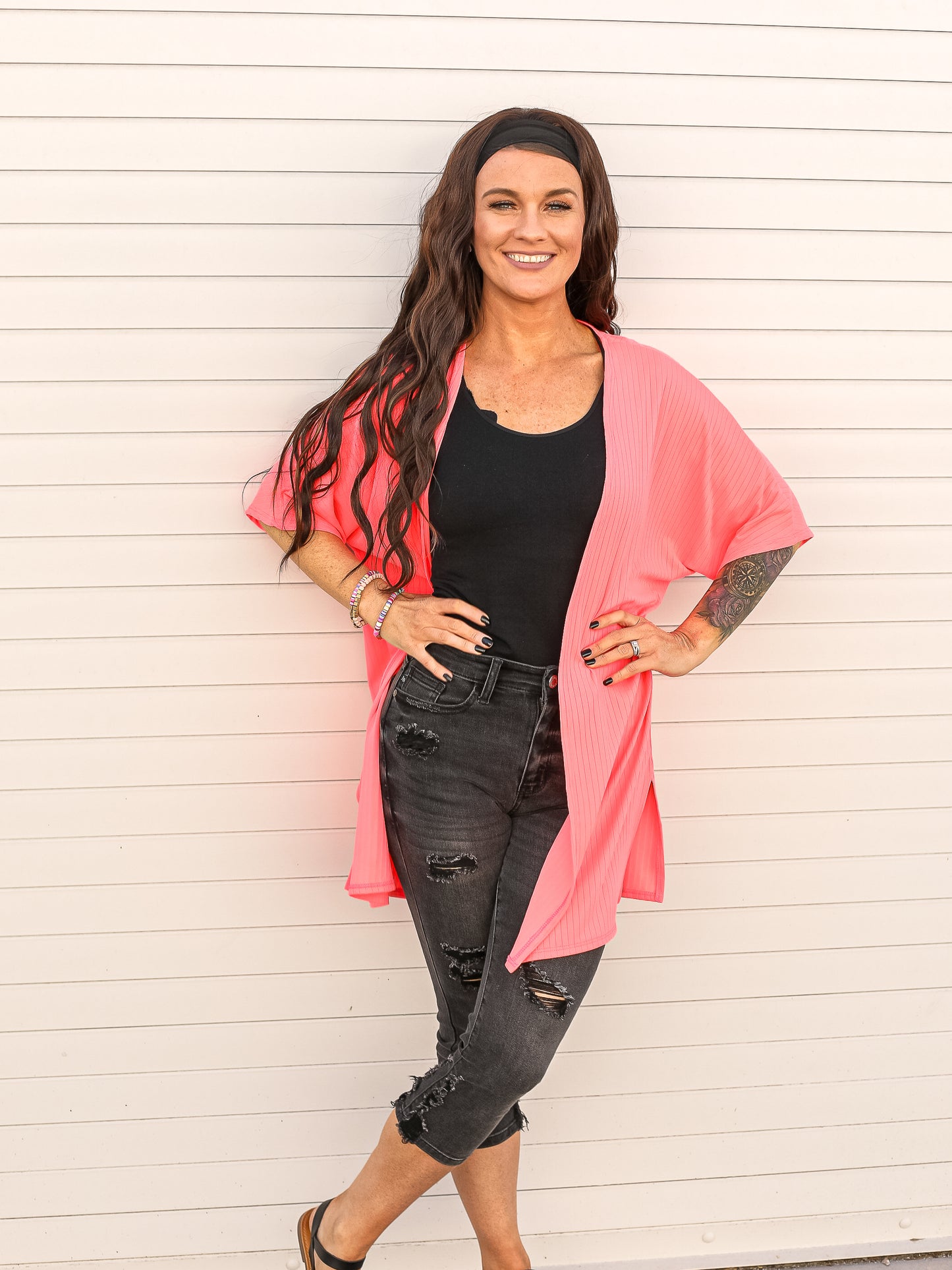 Neon pink short sleeve open front cardigan with ribbed details