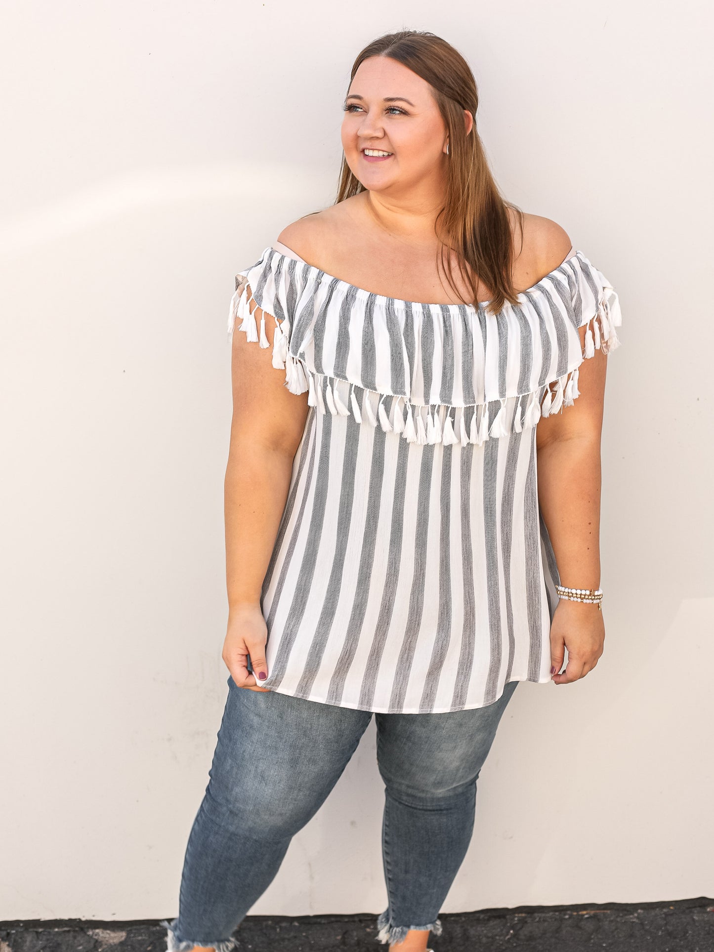 Off the shoulder white and grey striped blouse