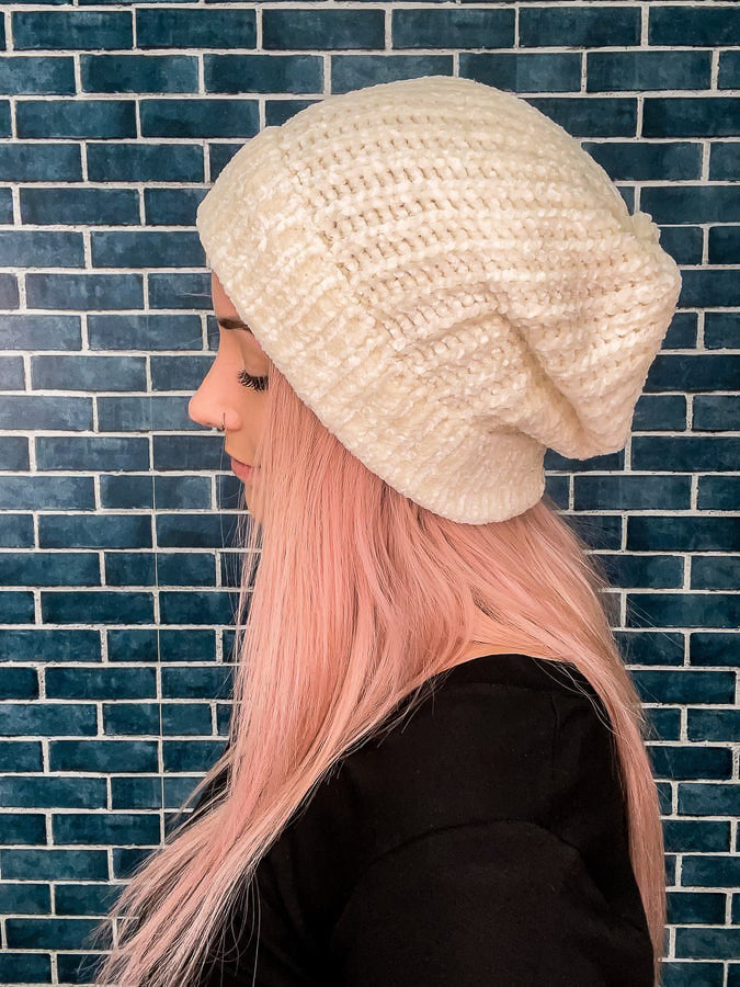 Ivory side view of beanie. 